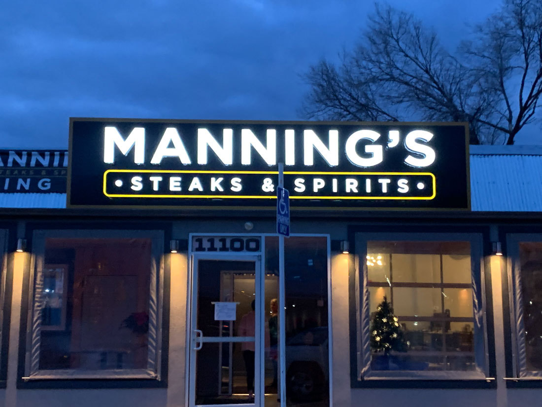 Manning's steak sign